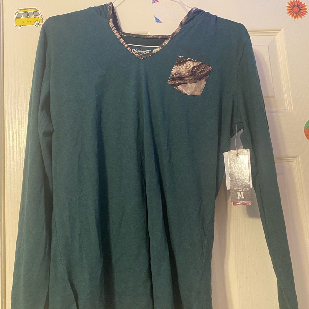 Size:medium. Color:green and has a little bit of camo